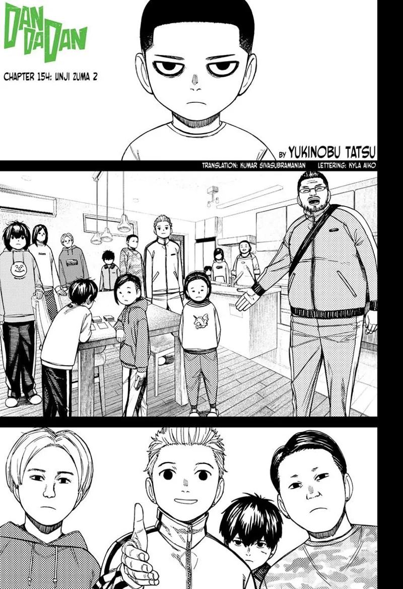 Unji looks serious while being introduced to a new home with other kids. One kid extends his hand to shake him.